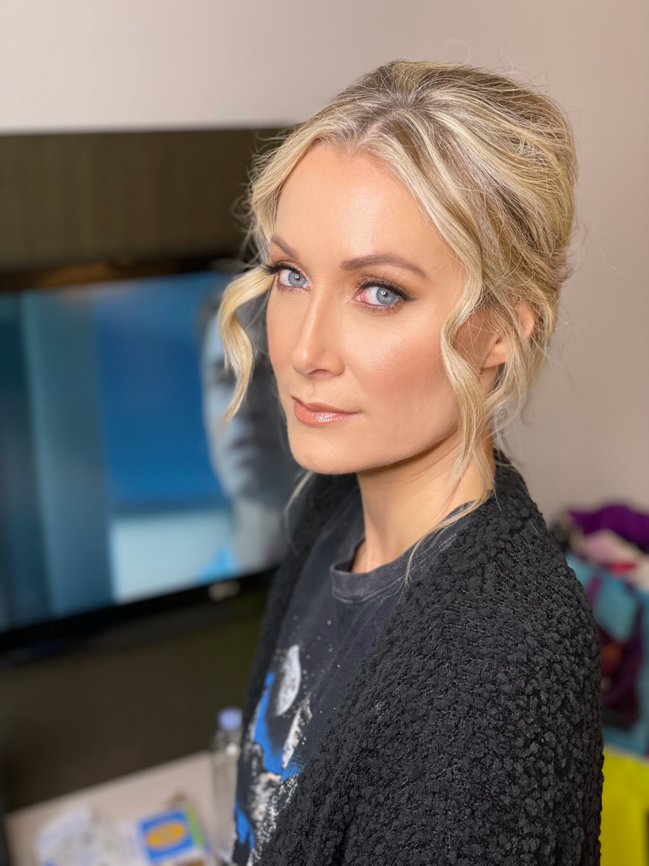 Blonde updo with smoky eye